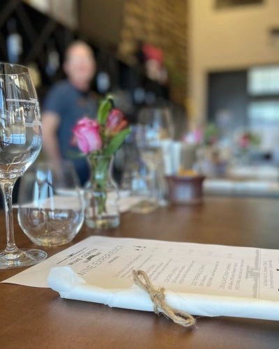 Guests participating in a guided wine tasting experience